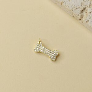 Obesek kost s cirkoni - rumena